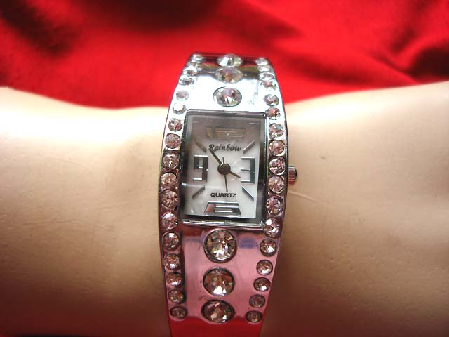 Online Silver bangle bracelet watch with center lined stones and small gems outsourcing exporter