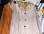 Muddy Chocolate lady's short coat with faux fur collar; faux fur highlight on chest, waist and hip line; button front closure