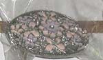 White floral belt buckle in oliver shape