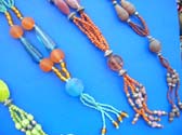 Fancy, ladies necklace with both mini beads and glass beads in an assortment of colors