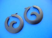 Balinese gift wear hoop earrings with tail design in center, handcrafted from organic wood