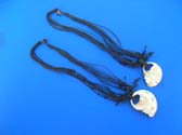Sea snail shell pendant on multi string balinese necklace