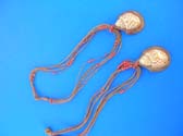 Ocean snail shell pendant on brown multi string necklace with beads