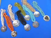 Ladies beauty bali, multi string beaded necklace with large sea shell pendant