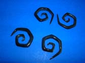 Squared edging on spiral organic horn earrings