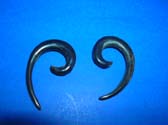Ear stretcher earrings in loose spiral design, crafted from buffalo horn