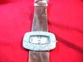 Brown strap on glamour watch with cz stone inlaid in large rectangle frame