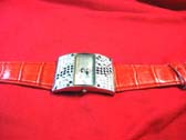 Imitation red leather strap on black and clear gemstone thick framed watch 