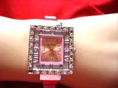 Teens fun fashion watch in pink with gemstone lined square frame to clock face 