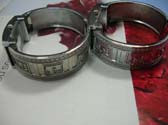 Metallic wear silver watch with G letter on bangle bracelet and square spiral theme on frame of clock face