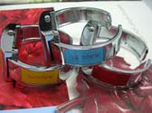 Colored enamel on side of silver bangle watch with rainbow and fun clock face design