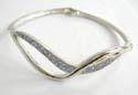 Fashion bangle in two curvy lines cross over in center design with multi mini light blue cz synthetic stone embedded on one side