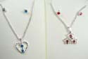 Fashion jewelry set, silver plated necklace holding assorted design pendant with mini cz stone embedded paired with stud earring. Spring ring clasp