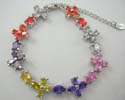 Fashion cz bracelet with assorted cz stone embedded in X and oval shapes, lobster claw clasp closure