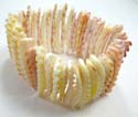 Multi long un flat assorted color seashell forming fashion bracelet