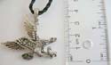Fashion necklace with black twisted cord string holding flying eagle mental pendant at center