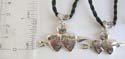 Fashion friendship necklace with black twisted cord string holding Jupiter sign-arrow cross double hearts