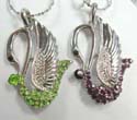 Fashion necklace holding swan feature pendant with multi cz stone embedded on bottom. Lobster clasp