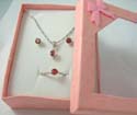 Fashion jewelry box set, silver plated chain necklace, stud earring and ring with red cz stone in rounded shape. Spring ring clasp