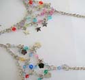 Fashion slave bracelet-ring with assorted color rhinestones embedded and multi silvery leaf, star, flower or key decor dangling