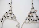 Fashion slave bracelet with multi diamond shape black rhinestones embedded and multi silvery star or bag decor
